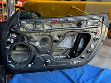 Door panel with CLD installed on door skin.