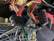 First one. Traced the two grey wires. One goes to the 15amp fuel pump/O2 sensor fuse, then to U15. Other goes to pin Q14, which goes to U15. They are connected as they should be, but oddly rather than connecting thru U15 plug it’s all taped together!? 