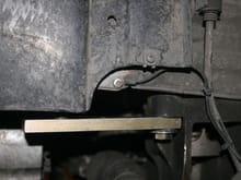 Side view of sway bar hanger attachment bracket.  Picture is misleading - it's actually almost perfectly horizontal