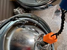 Most H4’s have a hole in the reflector for the city light. You see mine below the adapter.  I ended up using a RoW headlight harness that eliminates the orange adapter and included the plug for city lights.  Did this when I installed a relay kit created by one of our members.