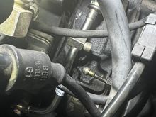 Off-set of new line against original chain tensioner hard line