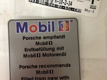 The factory used Mobil1.  Etwas anders ist verbotten kleber.  If you run DT40, this decal will ignite into a ball of flame.