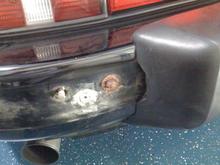 Corroded nut - had to cut it off.  Maybe this takes me down the path to make the whole rear bumper smooth?
