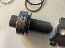 piston with the plate in the position it would be inside the housing