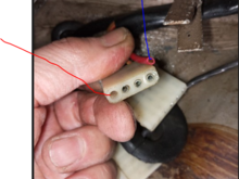 What is this loose/cut red wire(blue arrow)? Some modification the prior owner put in? 