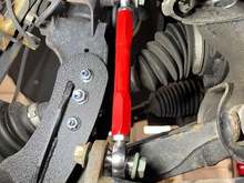 NOW, this is another Eurowise official pic from their product direct page... this is the passenger side endlink install. Cool red huh? But also, see how the bottom is installed on the "inside" of the swaybar vs the outside as factory? And as their first few photos?