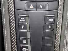 The 718 badge is no longer there just ahead of the emergency and lock buttons...
