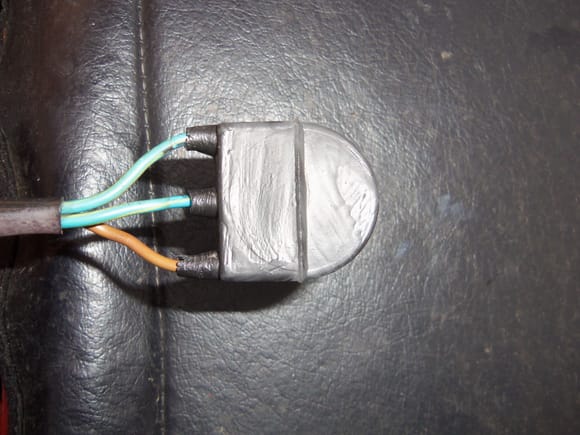 Radiator temperature switch boot, also 'painted' with liquid electrical tape.