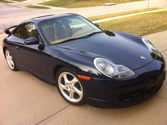 2000 996 with 20k, full aero kit, and looks mighty nice in ocean metallic blue.