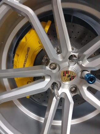 These are 22" wheels, 410mm rotors, and 6 piston 958 calipers. Because of the stepped barrel design of the wheel, there's not a lot of extra clearance space so wheel design, not just diameter is a factor that needs to be considered. 