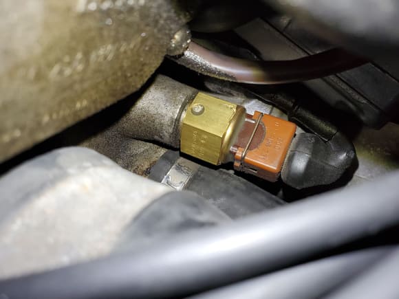 Let's call this Sensor 3 - This one is oriented horizontally at the front of the motor next to the large coolant hose.  It is a Bosch sensor # 0280130214 which when I search for it says it's a 35 C temp sensor.