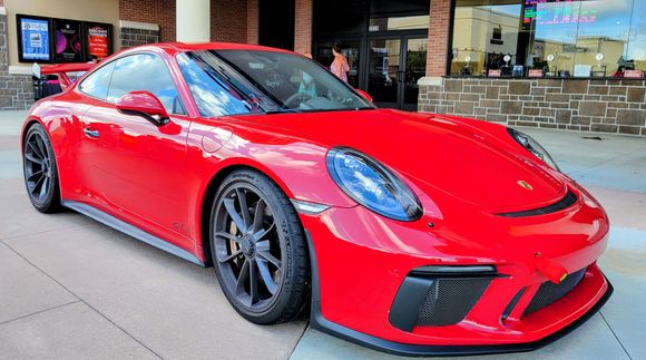 This 2018? 991 GT3 was fresh from the track, with rubber still adhered to the bumper and frunk. Guards Red?