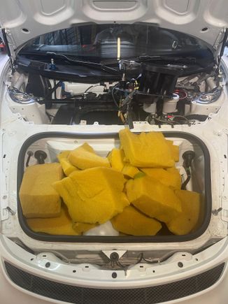 You can see the mess of old foam and failed displacement balls/blocksI pulled out of the fuel cell. It was just crammed in there and smashed into shap by the previous person who worked on the fuel cell before we bought the car.