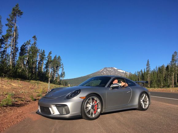 My freind Mark driving the car with Mt Bachelor in the background. 