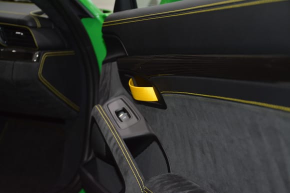 door pulls in yellow, with stitching in yellow