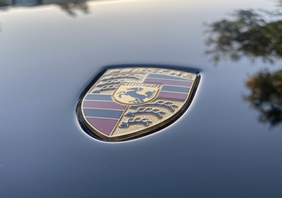 Is this the hood emblem? My 82 sits on top and is not inset like this. Did not know that was changed on later cars or is this custom?