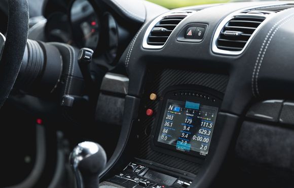 Original MoTeC C125 location on custom carbon fibre panel