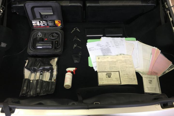 Air Pump, tools, spray bottle, paperwork, keys