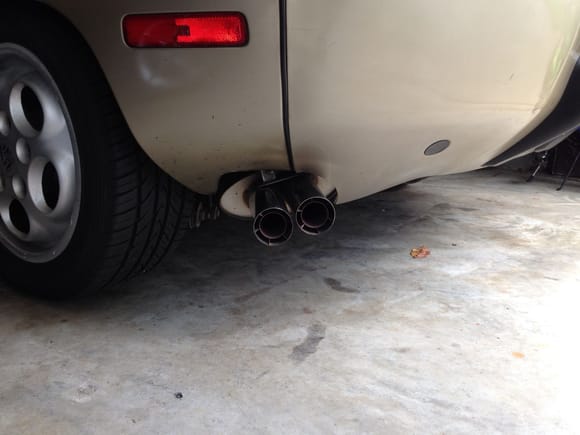 Was the muffler bent as a result of the read end impact?