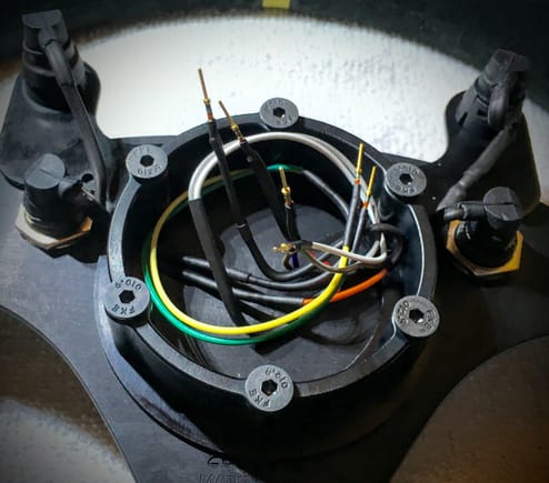 Wire the steering wheel buttons and note on your shrink or color code which wires run to which switch.  I used Raychem shrink boots on the wheel and HellermannTyton shrink boots on the QR.