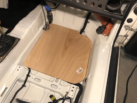 I'm just in the process of making a wooden track mat and installing a Rennline passenger floor board in my 964