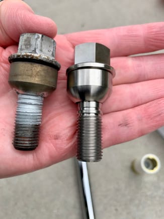 Stock '09 C2S lug bolt vs Acer Racing titanium lug bolt. Profound difference in material and manufacturing quality.