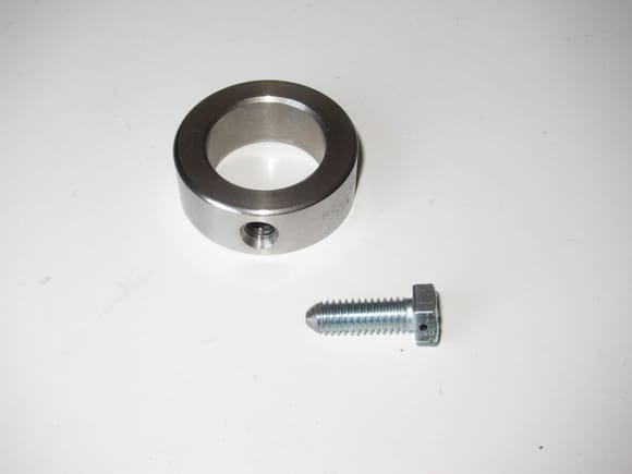 Ruland SC-18-SS 1 1/8" shaft collar and 5/16"-18 NC x 1" bolt, ground to a point and drilled for safety wire