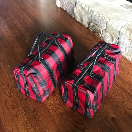 Two new beautiful 40 Jahre (circa 2003) matching and sequentially numbered canvas duffle bags. These were limited to 911 copies. Here are two of them. Trim is leather with deviating white stitching.