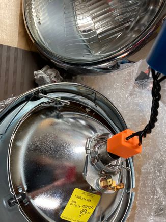 Most H4’s have a hole in the reflector for the city light. You see mine below the adapter.  I ended up using a RoW headlight harness that eliminates the orange adapter and included the plug for city lights.  Did this when I installed a relay kit created by one of our members.