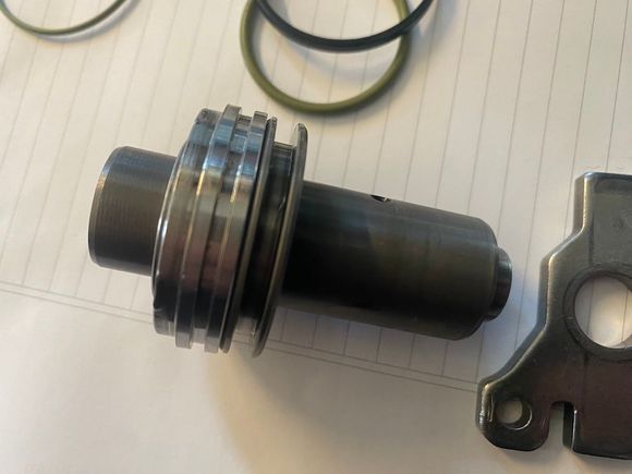 piston with the plate in the position it would be inside the housing