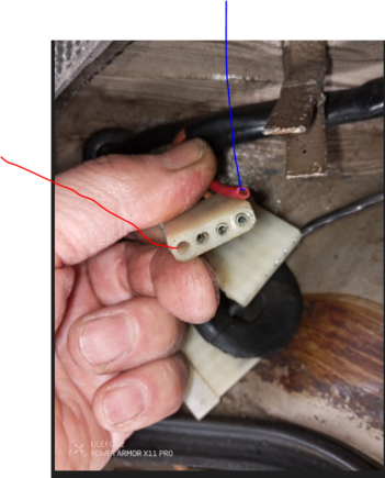 What is this loose/cut red wire(blue arrow)? Some modification the prior owner put in? 