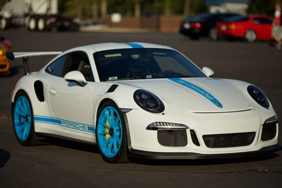 White with light blue graphics and wheels.