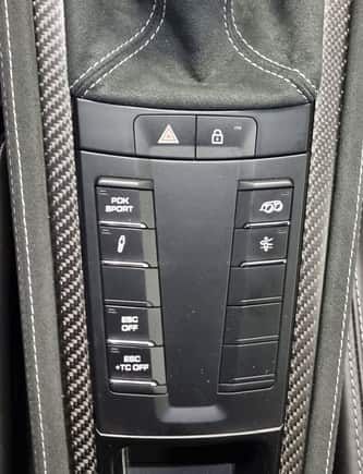 The 718 badge is no longer there just ahead of the emergency and lock buttons...