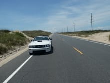 Many sand dunes along the road.