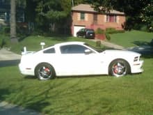 Performance White Mustang GT Coupe with Roush springs, 20&quot; Moz Cougar wheels, Legend Chin spoiler, 3d Carbon headlight splitters and MGP Caliper Covers