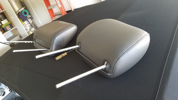 New headrest to the right, stock on the left