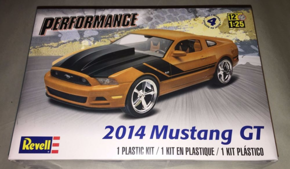 Revell has this 2014 Mustang GT plastic kit.  It has the stock parts inside but can be built up like the picture shown here, too.