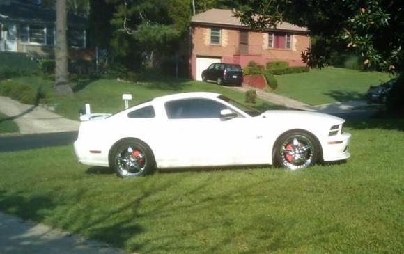 Performance White Mustang GT Coupe with Roush springs, 20&quot; Moz Cougar wheels, Legend Chin spoiler, 3d Carbon headlight splitters and MGP Caliper Covers