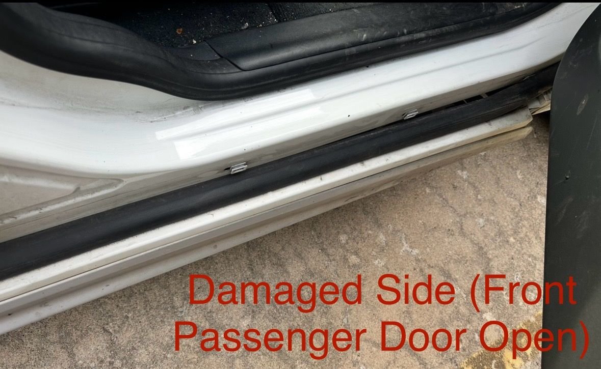 Additional close up of front passenger damage. 