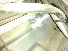 Driver side cowl coffer dam redirect water