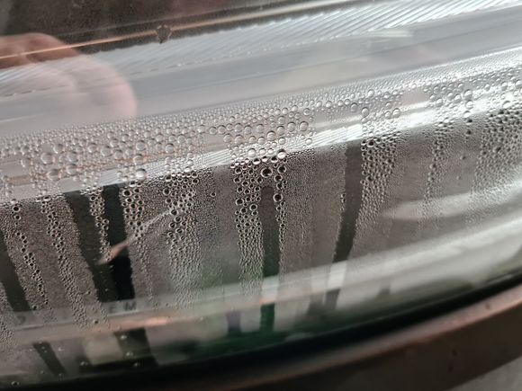 AGAIN Condensation on inside of headlights XC60 on december 2020 - this left lamp  was replaced in may 2020!! Very BIG drops of water inside.