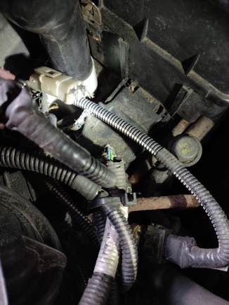 The white connector with fully broke wires
