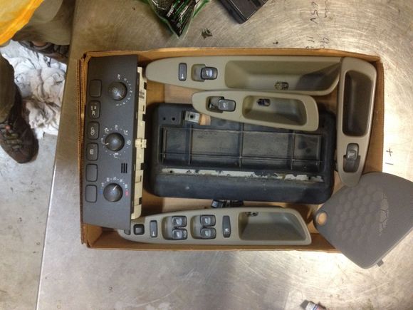 some stuff that also came from pull-a-part.  window switches, AC controller, and a front license plate holder