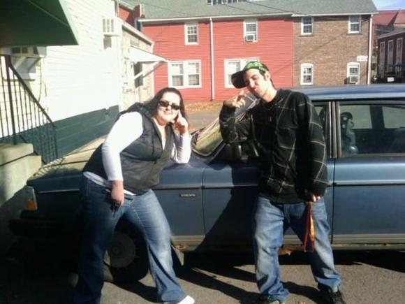 my sister and i posin by the volvo