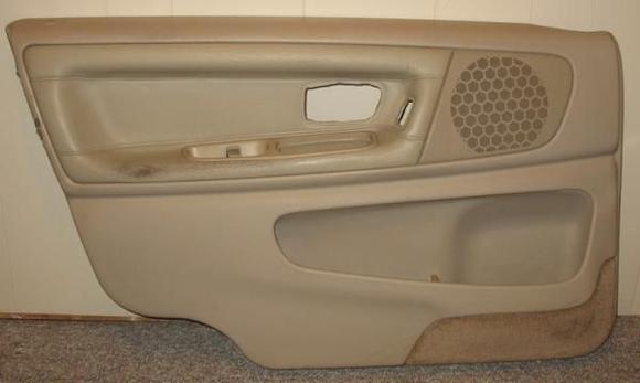 One of four door panels I bought for my 1998 V70. All 4 door panels in my car have separated in the armrest area. I found a set of V70R or T-5 SE door panels which have leather armrest inserts. They don't separate. The driver panel is in worse shape than the one in my car, so I want to swap the armrest insert.