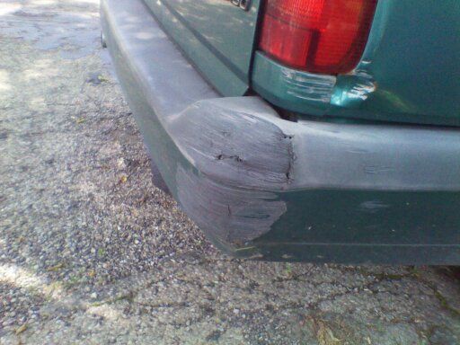 the bumper is trash and the dent below the light is going to cost me like 350 to fix the light is pushed up behind the gate a little.... has to go a frame rack..... the price is with out paint just primer