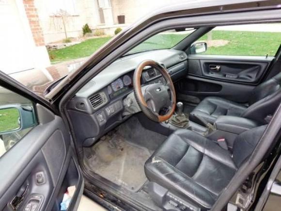 12/8/13 
Pic from seller's ad. Interior is sad, all door panels bubbled, drivers seat torn, steering wheel is disgusting.