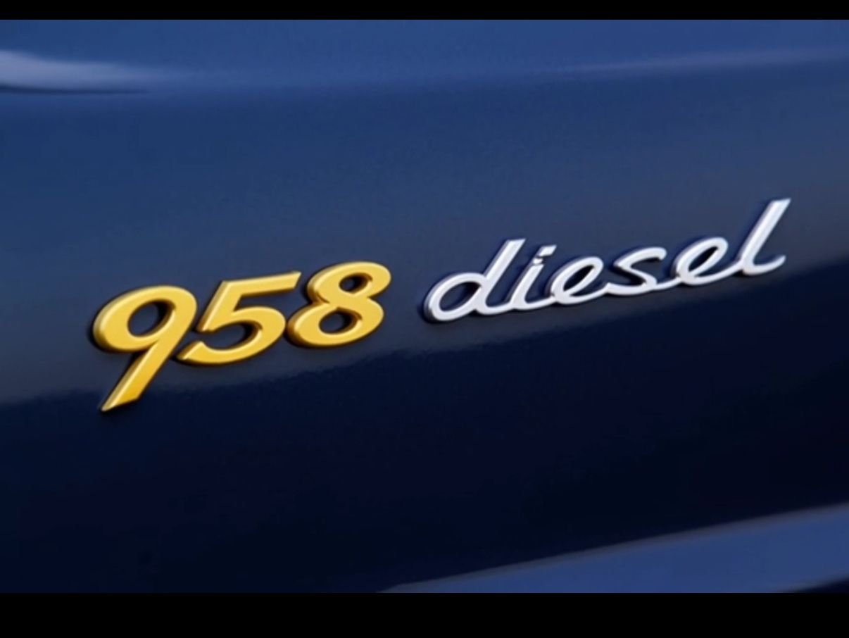 Yellow 958 Chrome diesel badge on nave blue background. 