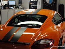 Porsche Cayman S Full Xpel Premium Wrap and custom FLX Paint Racing Stripes