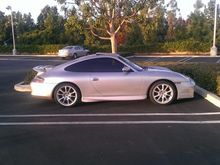 Side profile of Turbo front end, OEM flared rocker panels, GT3 wheels and Carrera Spoiler.